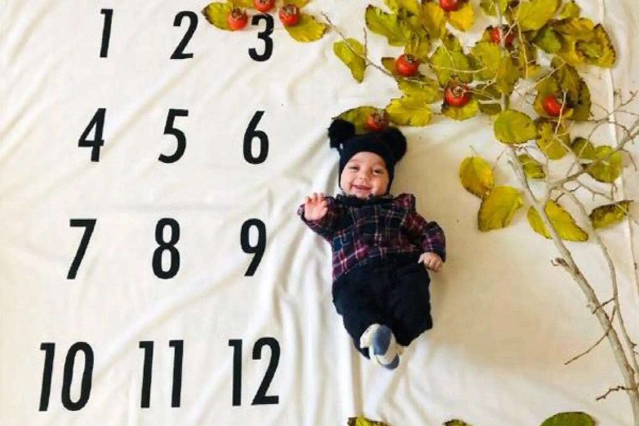 چطور عکس ماهگرد نوزاد در خانه بگیریم؟ نکات و ایده‌های جذاب